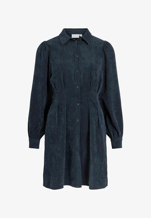 Temno modra kordurova srajčna obleka z ovratnikom, gumbi spredaj, dolgimi napihnjenimi rokavi in stranskimi gubi za sproščen oprijem.