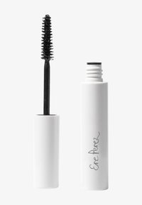 Reusable mascara con scovolino nero, racchiuso in un elegante tubetto bianco con testo scritto a mano in grigio. Texture liscia, design minimalista.