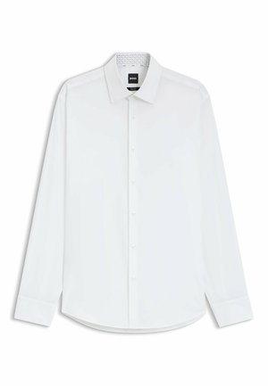 Camicia bianca a maniche lunghe con bottoni, in cotone, colletto classico, orlo dritto, colletto interno leggermente strutturato e bottoni simili a perle.