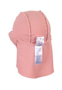 Pink fabric cap with a smooth texture and elastic band, featuring a care label on the side. Suitable for swimming or sun protection.