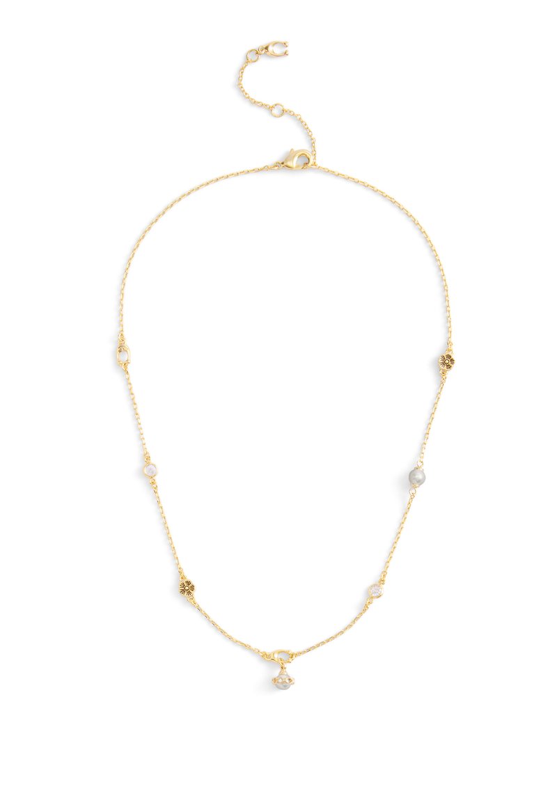 Kultaketu, jossa on pyöreitä aksentteja ja herkkiä jalokivikoristeluja. Säädettävä lukko vaihtelevaa pituutta varten.