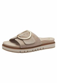 Beige suede slide sandal with thick sole and large gold buckle on the wide strap across the foot.