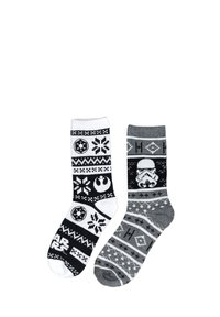 Calzini bianchi e neri con motivi di Star Wars, tra cui simboli e un design di Stormtrooper, caratterizzati da una texture lavorata a maglia e da diverse fantasia.