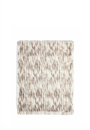 Tissu en fourrure rectangulaire doux avec un motif rayé blanc et marron clair, ressemblant à un imprimé animal.