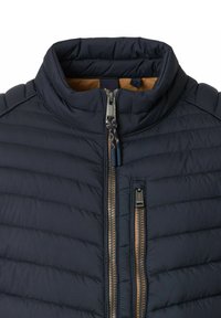 Navy puffer jacket with a high collar, featuring horizontal quilted pattern, two zipper pockets, and a contrasting interior color.