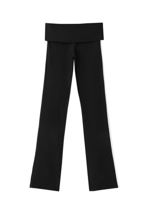 Pantalon de yoga noir taille haute avec une large ceinture rabattue et des jambes droites, posé à plat sur un fond blanc.