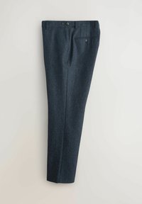 Laivastonvillaiset housut, joissa on teksturoitu pinta, suora leikkaus, kaksi etutaskua ja yksi takatasku. Edessä kaksi nappia.