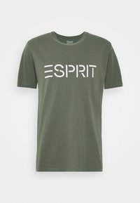 Olivengrünes Baumwoll-T-Shirt mit Rundhalsausschnitt, kurzen Ärmeln und einem auffälligen weißen "ESPRIT"-Logo auf der Vorderseite. Glatte Textur.