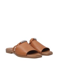 Brown leather slide sandals with an open toe and a low heel, featuring a decorative silver-tone bead accent on the strap.