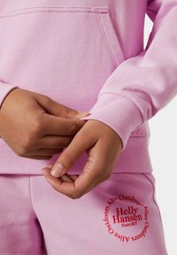 Helly Hansen CORE GRAPHIC - Jersey con capucha - rosa