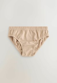 Beige katoenen ondergoed met een elastische tailleband en beenopeningen, plat gelegd op een lichtgrijze ondergrond.