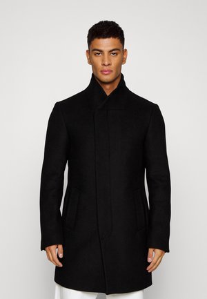 HIDDEN BUTTON PLACKET - Classic coat - black