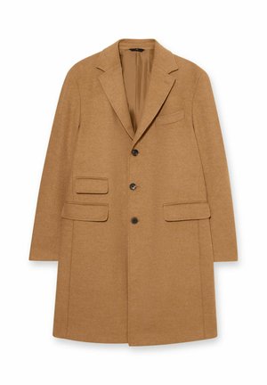 Camelkleurige wollen jas met een reverskraag, twee voorzakken en drie knopen. Voorzien van een gladde voering aan de binnenkant.