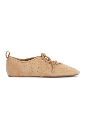Light brown suede flat shoe with pointed toe, lace-up front, perforated side details, and pull tab at the heel.
