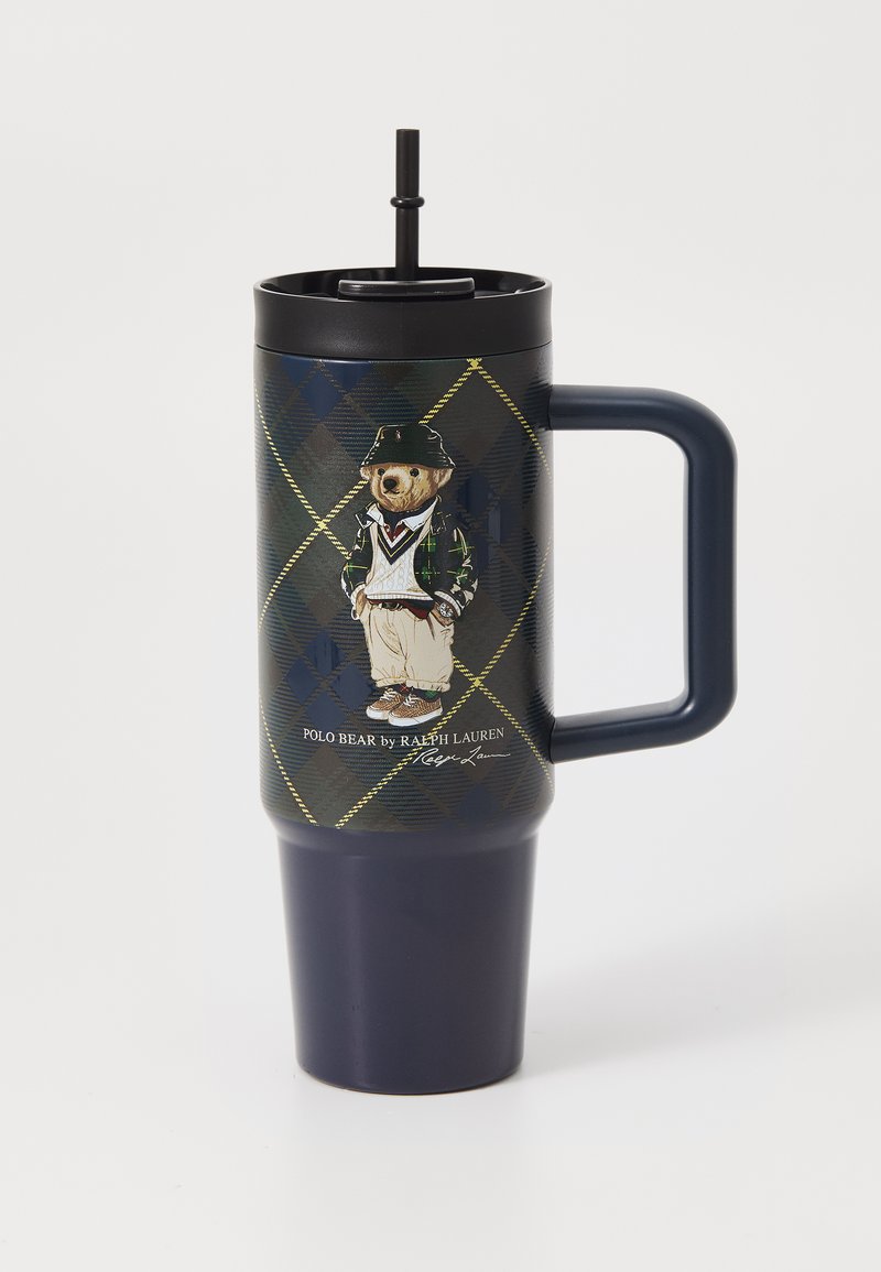 Mornarsko izolirano kozarico s črnim pokrovom in slamico, ki prikazuje natisnjenega medveda Polo v klasičnem oblačilu na ozadju diamantskega vzorca.