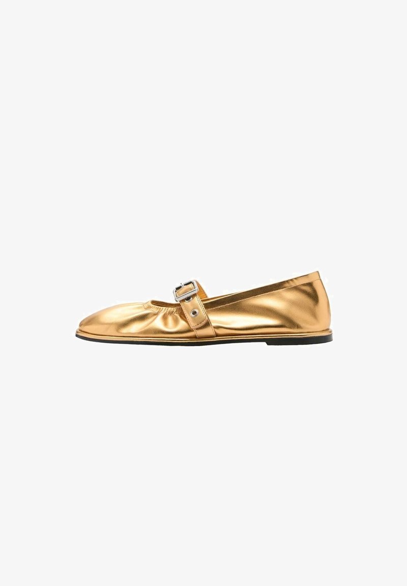 Gold metallic flat shoe with a rounded toe, gathered front, and adjustable strap featuring a silver buckle. Flat sole with minimal tread.