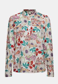 Blouse à manches longues avec un col montant, ornée d'un mélange de fleurs roses, rouges et vertes sur fond blanc. Tissu léger.
