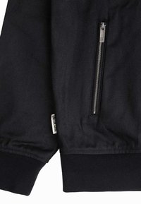 UNFAIR ATHLETICS Bombera - black