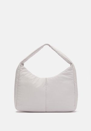Light gray padded shoulder bag with a curved shape, featuring a single handle and a smooth, textured surface. Simple design with no additional hardware.