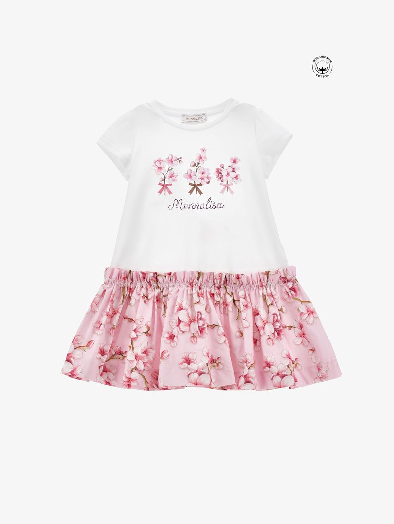 Top alb din bumbac cu mâneci scurte, cu un print floral și textul "Monnalisa". Fustă roz cu tiv ondulat, ornamentată cu un model floral.