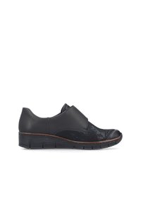 Chaussure compensée basse noire combinant cuir lisse et texturé avec une semelle flexible striée et un bout arrondi.