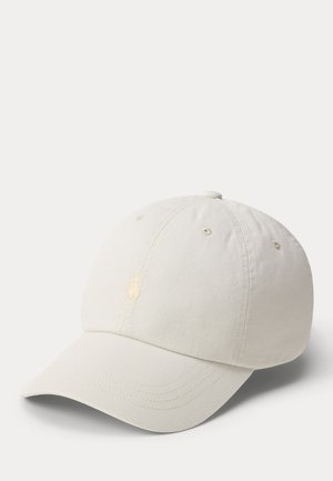 Off-white baseball cap with curved brim and subtle stitched logo on front panel, shown against a plain light background.