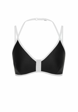 Black bra with white trim, adjustable straps, and a front center panel on a plain white background.