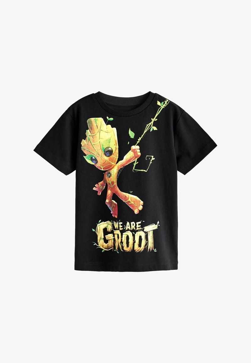 Musternähtud must puuvillane T-särk, millel on joonis koomiksitegelasest, kes hoiab oksa, ja millel on paksult kollastes tähtedes "ME OLEME GROOT" tekst.