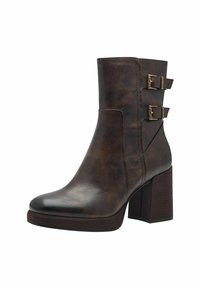 Bottine en cuir brun avec deux boucles dorées, un bout carré et un talon épais. Fini texturé avec un capuchon de bout lisse et brillant.