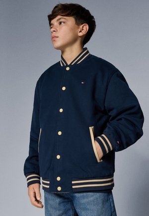 Tommy Hilfiger REVERSIBLE JACKET UNISEX - Pilotska jakna - gentle gold coloured/dark night navy