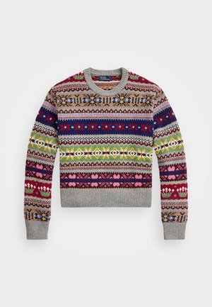 Pull en tricot avec motifs géométriques multicolores, col rond et poignets côtelés. Couleurs dominantes : rouge, vert, bleu et gris.