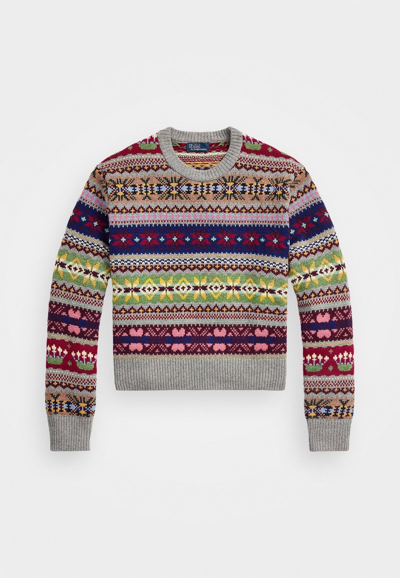 Pull en tricot avec motifs géométriques multicolores, col rond et poignets côtelés. Couleurs dominantes : rouge, vert, bleu et gris.