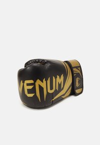 Black boxing glove with gold markings, made of synthetic leather. Features a curved shape and wrap-around wrist strap for support.
