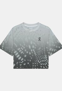 T-shirt de sport gris dégradé à manches courtes avec motif abstrait à points et petit logo noir "on" sur la poitrine gauche.