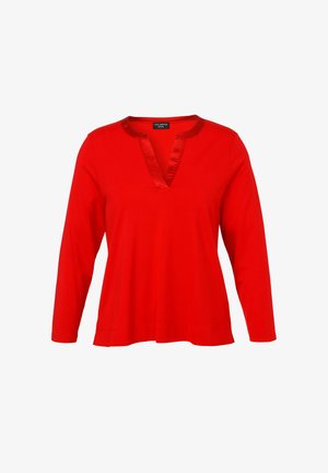 Red long-sleeve V-neck top with satin trim at the neckline, made from a smooth fabric, featuring a loose fit and simple design.