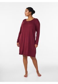 Bordo obleka z dolgimi rokavi, V-izrezom in čipkastimi detajli na izrezu. Iz mehke, raztegljive tkanine za udobje.