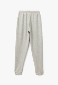 Grijze sweatpants van een zachte stof, met een elastische tailleband en ribbelvoering bij de enkels, met een gladde, effen textuur.