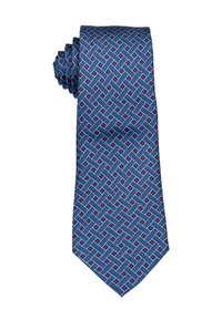 Sinine lips, millel on geomeetriline muster diagonaalliinide ja väikeste punaste ruutudega, pealmine osa rullitud valge tausta vastu.