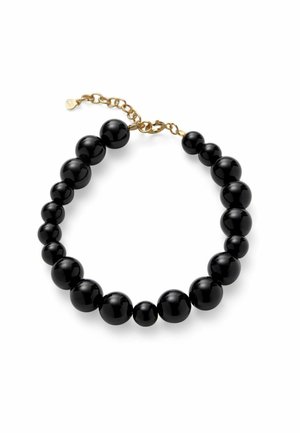 Lesklý čierny náramok s postupne zväčšujúcimi sa guľatými korálikmi a zlatou zapínacou retiazkou na bielom pozadí.