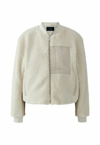 Crème-kleurige bomberjack gemaakt van een gestructureerde, pluizige stof, met een gladde beige opgestikte zak en ribgebreide manchetten.