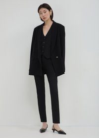 Calliope Chino - nero