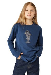 Langärmliges navyblaues T-Shirt mit einem Cartoon-Wolf-Design auf der Brust. Aus weicher Baumwolle mit lockerer Passform.
