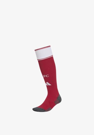 Roter knielanger Sportsocken mit weißem Oberband, grauem Zeh und Ferse, mit teilweisem weißen Schriftzug und Logo.