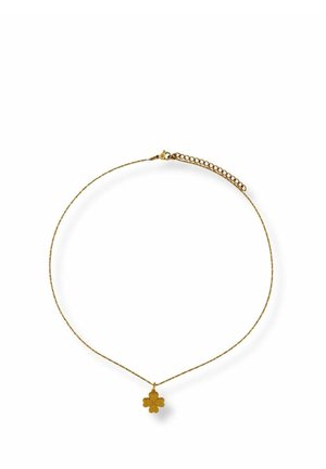 Delicate gold chain necklace with a small four-leaf clover pendant and an adjustable link clasp.