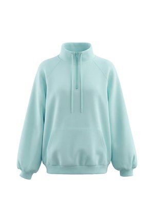 Lyseblå pullover sweatshirt med halvt lynlås foran, høj krave, front kengurulomme og lange puffede ærmer med manchetter.