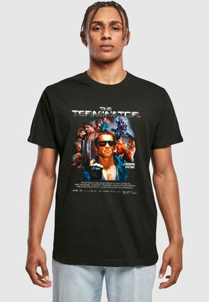 Black cotton t-shirt featuring "The Terminator" graphic print, including character images and text in white and colorful details.