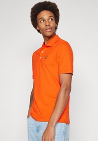 Lyle & Scott Polo - tangerine tango