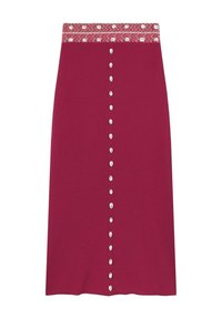 Gonna midi color marrone con una cintura decorata, caratterizzata da bottoni decorativi sulla parte frontale. Realizzata in un tessuto morbido con leggero elasticità.
