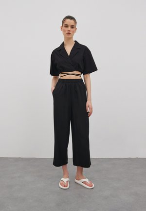 EDITED NONA - Trousers - schwarz