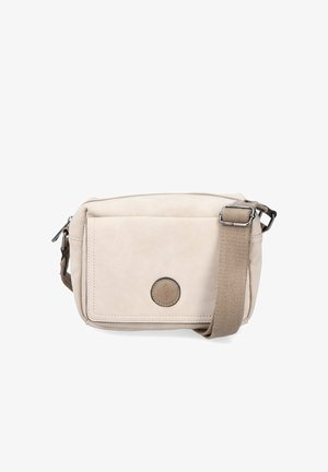 Beige crossbody bag with front flap pocket, round logo patch, and adjustable brown fabric strap with metal buckle.